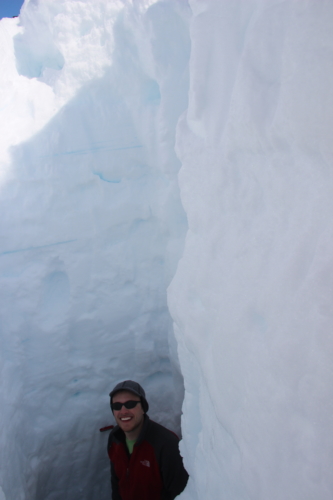 Josh in pit, collecting snow samples - Denali National Park